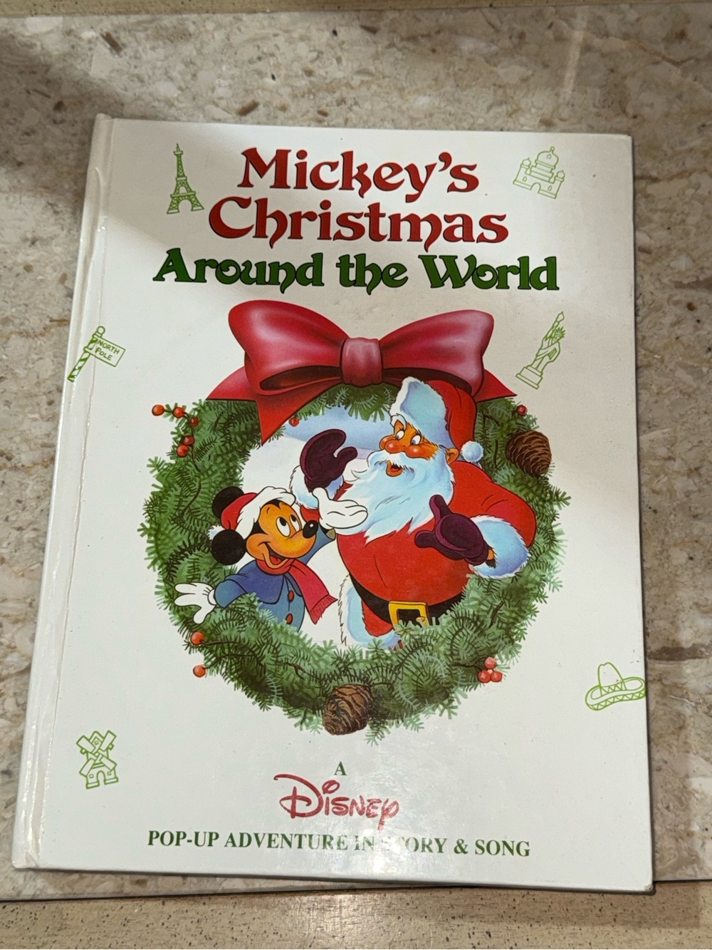 Mickey's Christmas Around the World: A Disney Pop Up Adventure in Story & Son